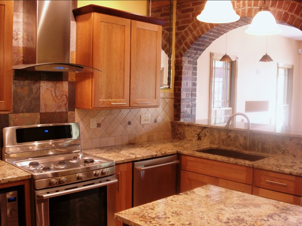 Beautiful kitchen remodel with modern appliances and granite countertops